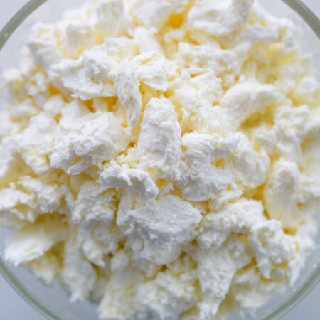 A plate with fresh delicious and healthy cottage cheese. Proper nutrition for children for breakfast.の写真素材