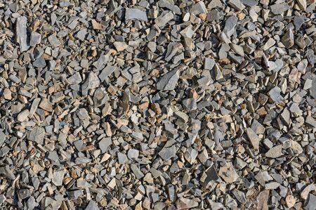 Texture of a dark yellow granite stone or background for design.
Surface of the rock with an abstract pattern.の写真素材