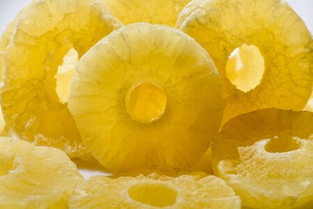 Dried pineapple candy rings, close-up.の写真素材