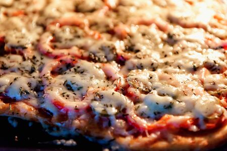 Pizza oven. Delicious pizza cooked in the oven. Cheese pizza is tasty and delicate. Italian pizza...