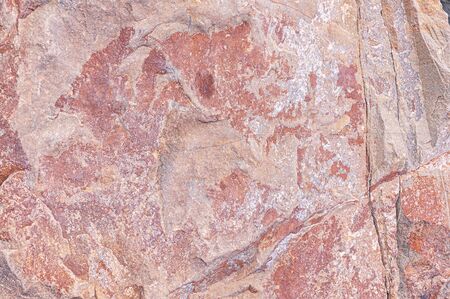 Stone texture. Granite natural surface.  Stone old wall. Texture pattern. Natural stone close-up. Structural surface close-up.の写真素材