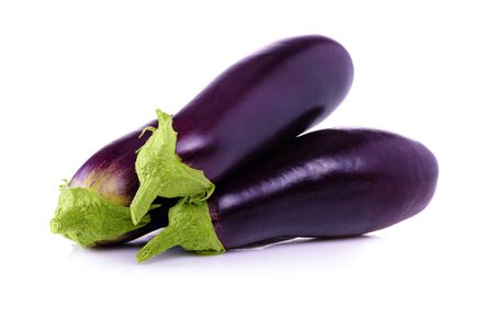 Eggplant on white background close-up. Ripe eggplant. Fresh eggplant from garden. Vegetarian food. の写真素材