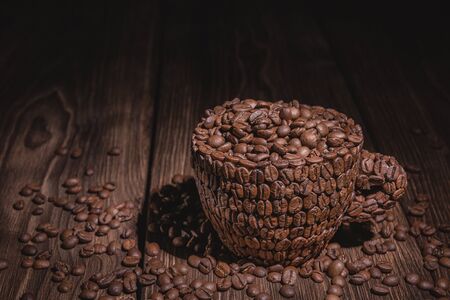 Coffee Cup Table Tree. Cup of coffee wooden table. Full cup of coffee beans wooden table.の写真素材