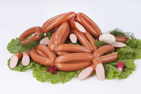 Composition of the sausages and vegetables.の写真素材