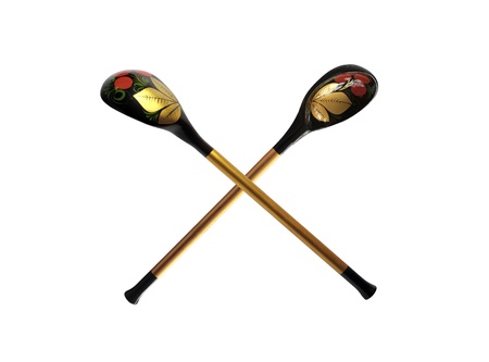 Two wooden spoons with color varnished pattern isolated over white backgroundの写真素材