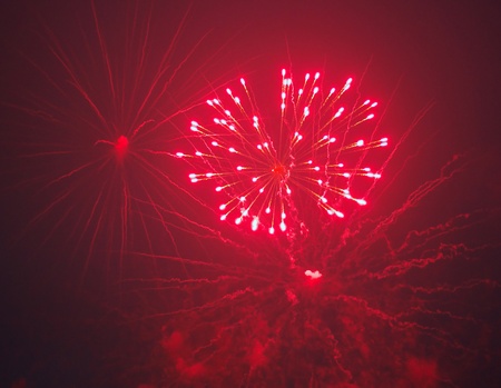 Fireworks blasts on a night black skyの写真素材