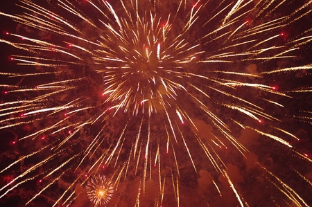 Fireworks blasts on a night black sky