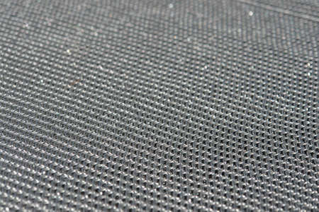 Closeup of old steel chain armour, material backgroundの写真素材