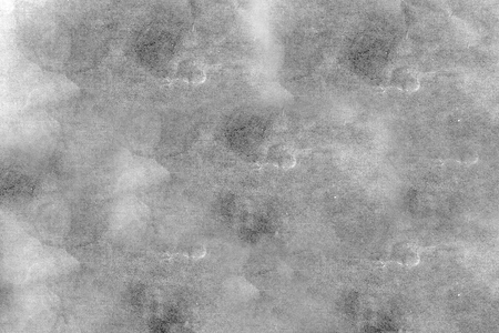 gray vintage paper with large and small divorces, spotsの写真素材