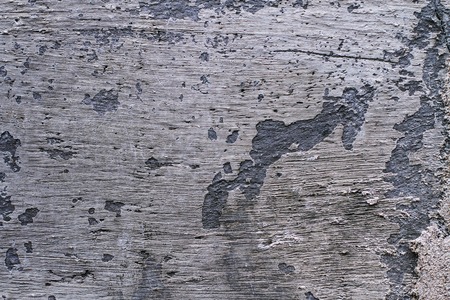 The old gray-brown peeling wall - interesting textureの写真素材