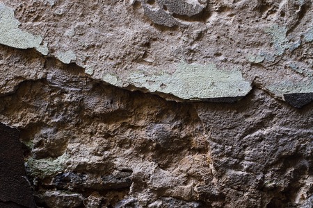 Dilapidated wall of the old city backgroundの写真素材