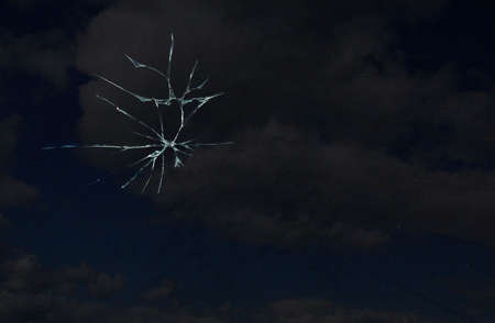 abstraction crack on broken glass and mirror on an isolated backgroundの写真素材