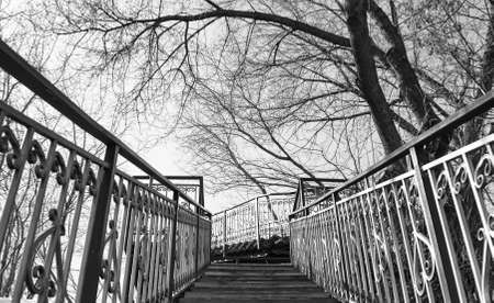 a pedestrian staircase that goes up to the skyの写真素材
