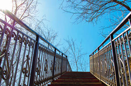 a pedestrian staircase that goes up to the skyの写真素材