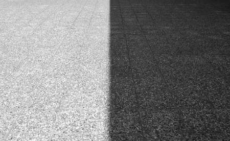 ancient masonry of cobblestones and stones for the sidewalk wall and road, street of the ancient cityの写真素材