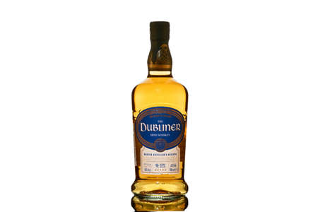 The Dubliner Irish Whisky bottle white backgroundの写真素材
