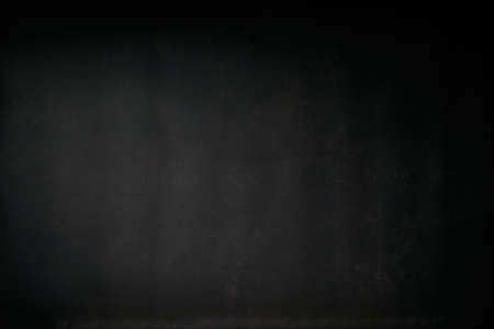 Dark black lime wall metal or stone background. The texture of the surface of the lime table or wall. Background for design, menu and text tiles.の写真素材