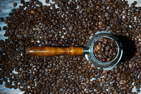 Coffee pot (Cezve) and coffee beans flatlay.の写真素材