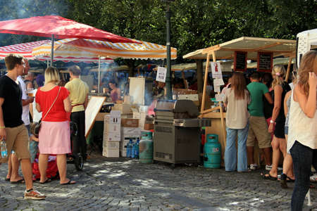 Prague,Czech Republic.07.26.2018.Locals buying at street Market in Prague, the capital of Czech Republic.のeditorial素材