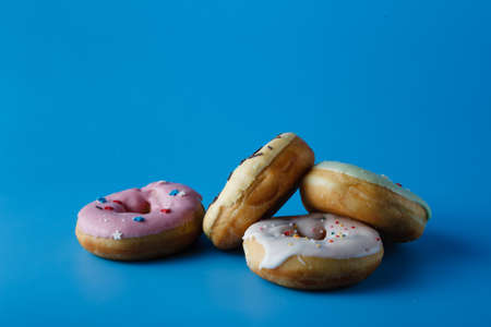 Donuts on blue shadeless backgroundの写真素材