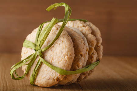 Bounded Oat cookies lies on wood table