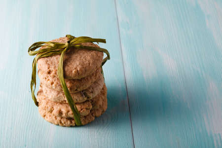 Oat cookies on wood table, copyspaceの写真素材