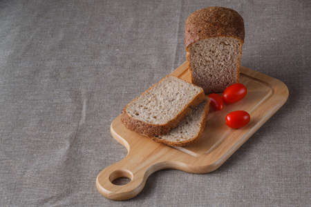 Sliced bread on woodの写真素材
