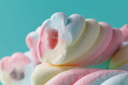 Twisted marshmallow on vibrant background, closeupの写真素材