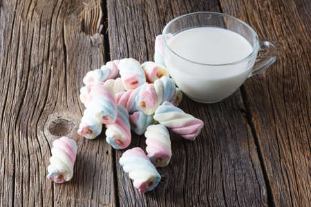 Twisted colored marshmallow with milkの写真素材