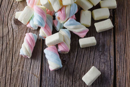 colored marshmallow on wooden table. Top placeの写真素材