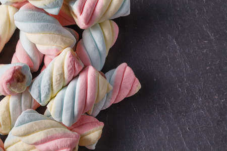 Fun sweet frame on slate black background for text placement. Top viewの写真素材