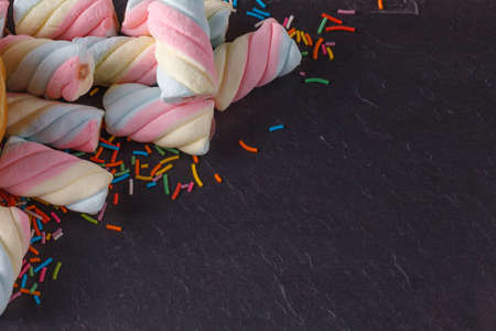 Fun sweet frame on slate black background for text placement. Top viewの写真素材