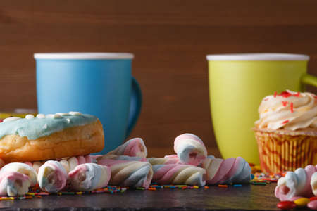 Fun sweet frame on slate black background for text placement. Top viewの写真素材