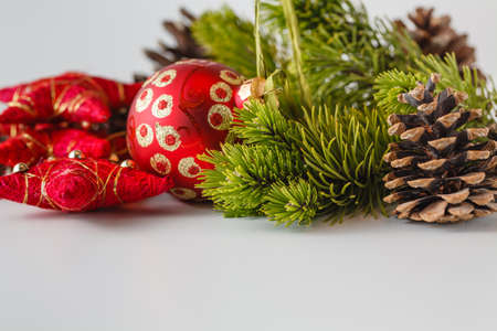 New Year and Christmas scene decoration with pine, cones and stars on white background