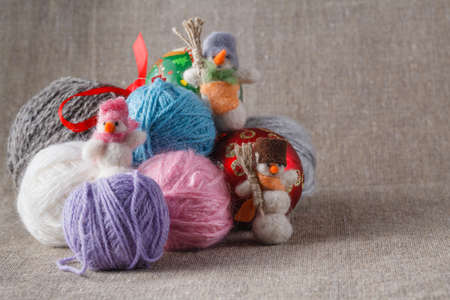 Colored clew with christmas balls on cloth