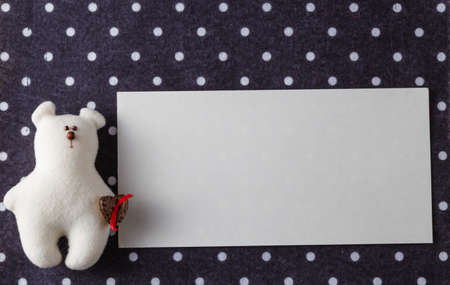 Kid greeting card concept. Felt doll on colorful background wit copy spaceの写真素材