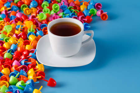 Kid breakfast concept. Colored mosaic and cupcake with teaの写真素材