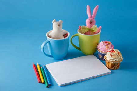 Kid art activities concept. Album for drawing and funny pink bunnyの写真素材