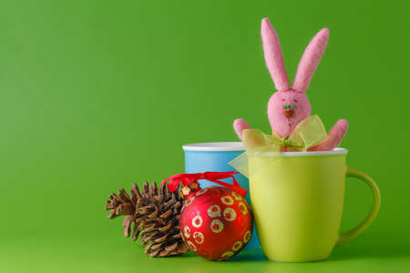 Kid funny breakfast. Mug with pink bunnyの写真素材