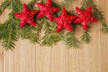 Flat star toys on wooden backgroundの写真素材