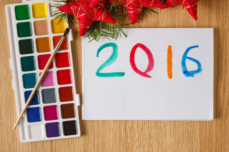 Drawing colored year symbol on paperの写真素材