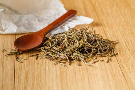 Special chinese tea puer, tea leaf on wooden tableの写真素材