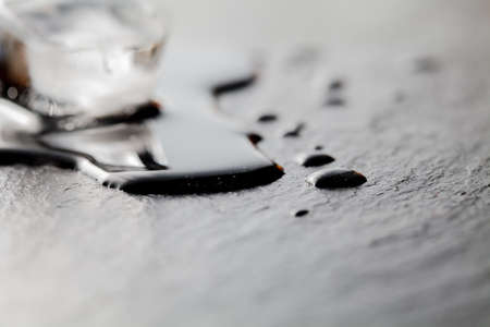 Melted ice on slate plate.の写真素材