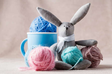 Handmade bunny on soft backgroundの写真素材