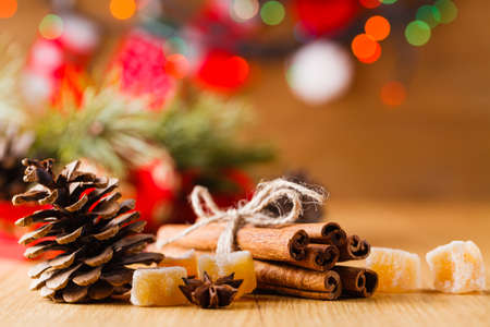 New year decoration on table with cinnamon sticksの写真素材