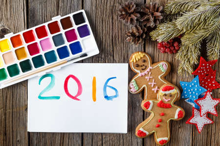 Painted christmas greeting. Kids drawing year symbol on paperの写真素材