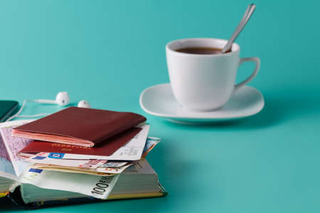 Ready for travel. Low cost choice for couple with cup of teaの写真素材