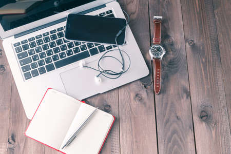 Top view desk with laptopの写真素材