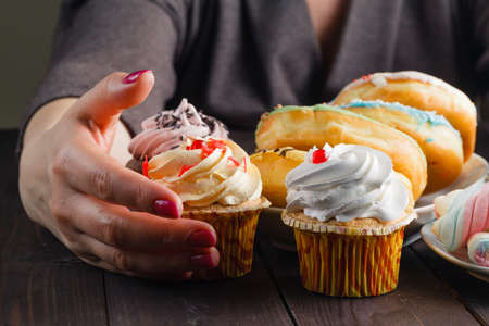 how many sweets and donuts you can eat at onceの写真素材