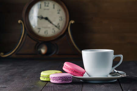 Colour french cookies on dark rustic wooden tableの写真素材